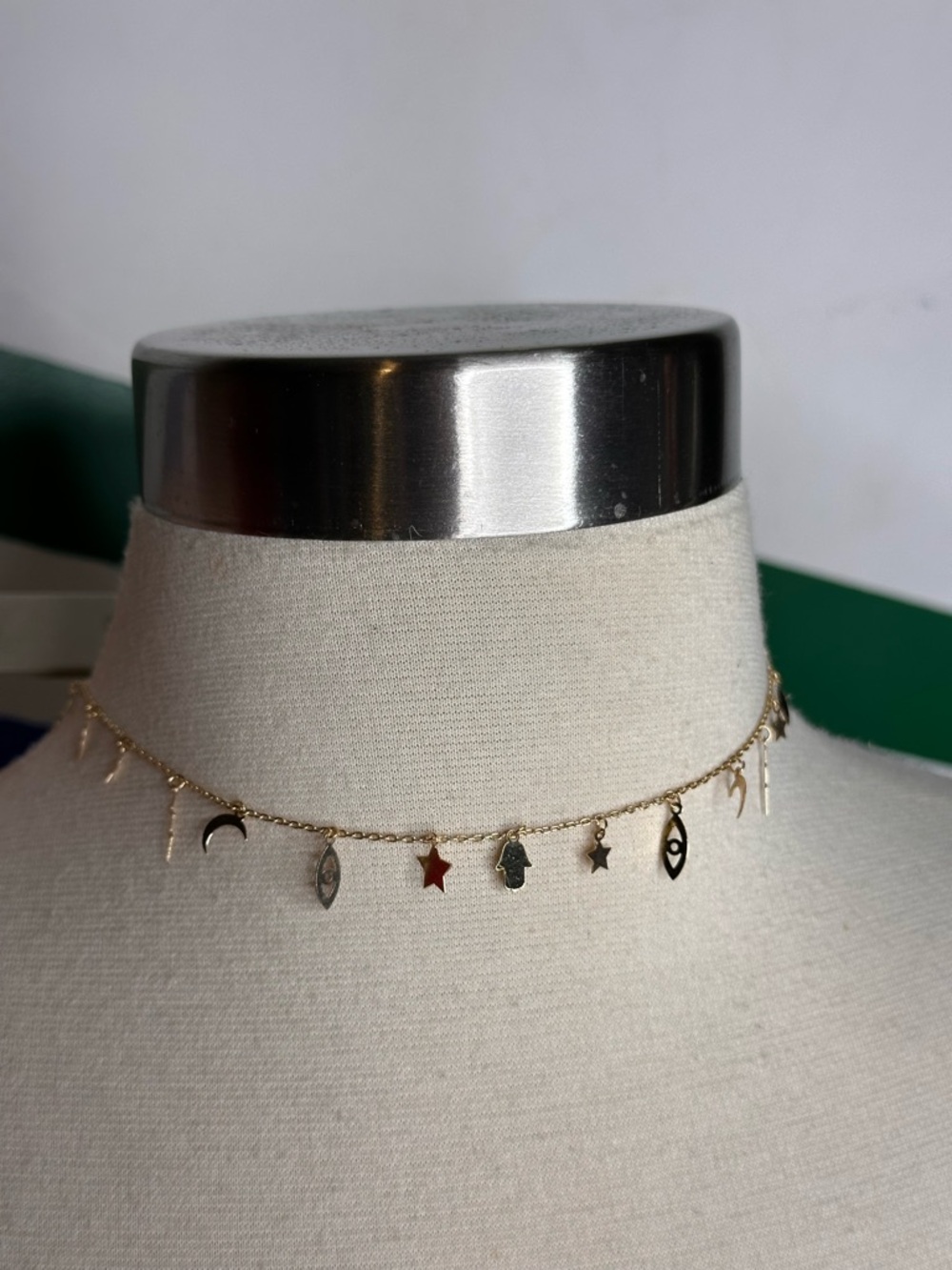 NEW Urban Outfitters icon in the stars gold colored necklace
